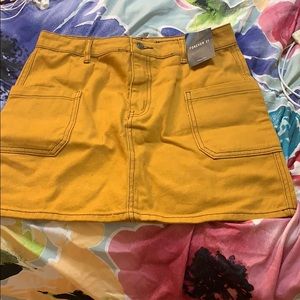 Mustard yellow mini skirt
